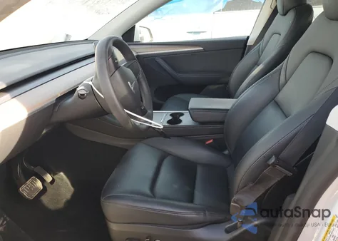 2023 Tesla Model Y from USA, damaged, VIN 7SAYGDEE7PA114728